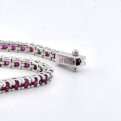 Bracelet Bracelet tennis en or blanc 18 kt avec rubis et diamants 58 Facettes 236 OC