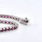 Bracelet Bracelet tennis en or blanc 18 kt avec rubis et diamants 58 Facettes 236 OC