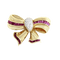 Broche Broche nœud en or jaune, rubis et diamants 58 Facettes 65000020