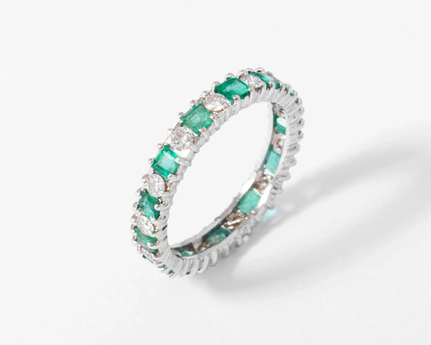 Bague 66 Alliance - Bague en or gris avec diamants et émeraudes 58 Facettes 1