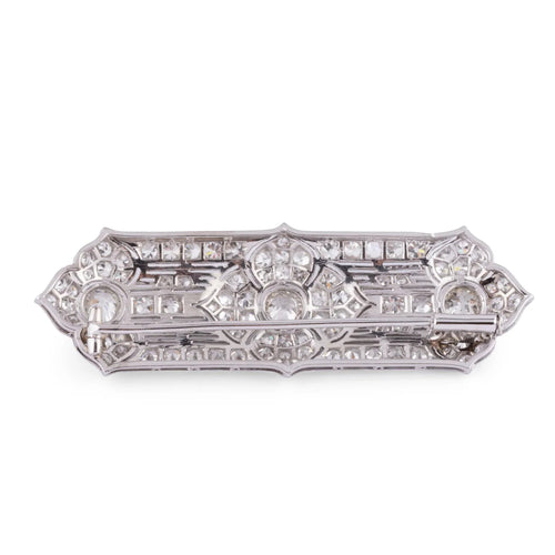 Broche Broche en platine et diamants 58 Facettes 1