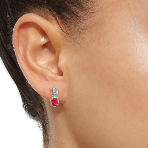 Boucles d'oreilles Boucles d'oreilles en or blanc 18 carats, rubis et diamants 58 Facettes GER1014RD