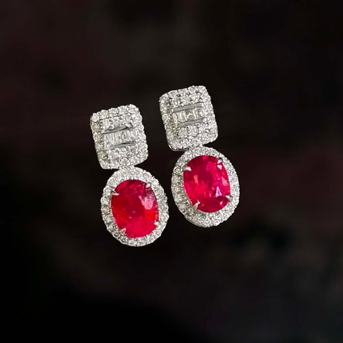 Boucles d'oreilles Boucles d'oreilles en or blanc 18 carats, rubis et diamants 58 Facettes GER1014RD