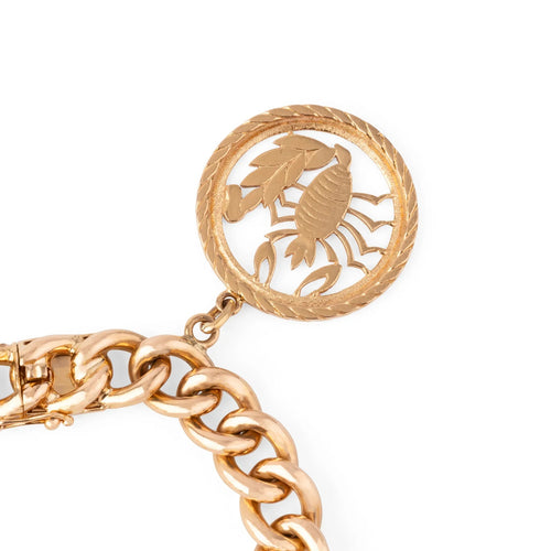 Bracelet Bracelet - Maillon gourmette en or rose 18k avec 4 breloques 58 Facettes 1
