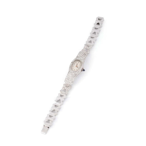 Montre Montre Art Déco ovale en platine et diamants 2,50 cts 58 Facettes 1