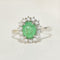 61.5 Bague entourage en or blanc 18K avec émeraude et brillants 58 Facettes 2340