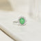61.5 Bague entourage en or blanc 18K avec émeraude et brillants 58 Facettes 2340