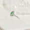 61.5 Bague entourage en or blanc 18K avec émeraude et brillants 58 Facettes 2340