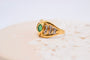 Bague 50 Bague nœud en or jaune, émeraude et diamants 58 Facettes 3988