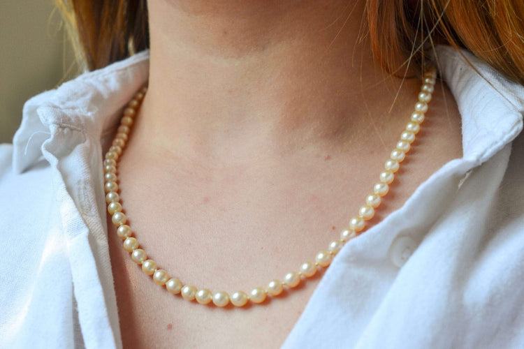 Collier Collier en or jaune 18 carats et perles de culture 58 Facettes 4011