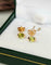 Boucles d'oreilles Boucles d'oreilles puces en or rose et péridots 58 Facettes 738