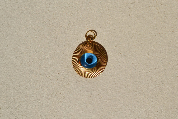 Pendentif Pendentif œil protecteur en or jaune 18 carats et pierre bleue 58 Facettes 3932