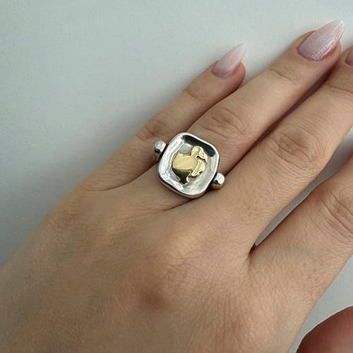 Bague 51 Dodo - Bague tournante animalier en argent et or jaune 58 Facettes 19394