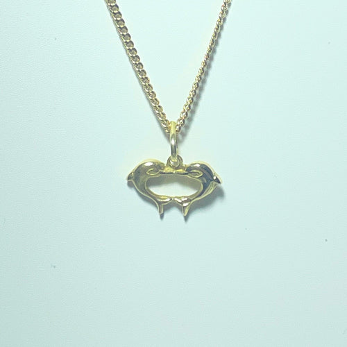 Pendentif dauphins en or 18 carats 58 Facettes 260127