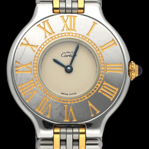 Montre Cartier 21 Must de Cartier - Montre quartz en or et acier 58 Facettes CRT/MST/012
