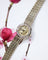 Montre Montre 1950 en or blanc et diamants 58 Facettes A12071