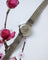 Montre Montre 1950 en or blanc et diamants 58 Facettes A12071