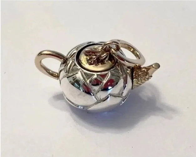 Pomellato Cinq heures - Pendentif théière Lotus en argent et or rose 58 Facettes