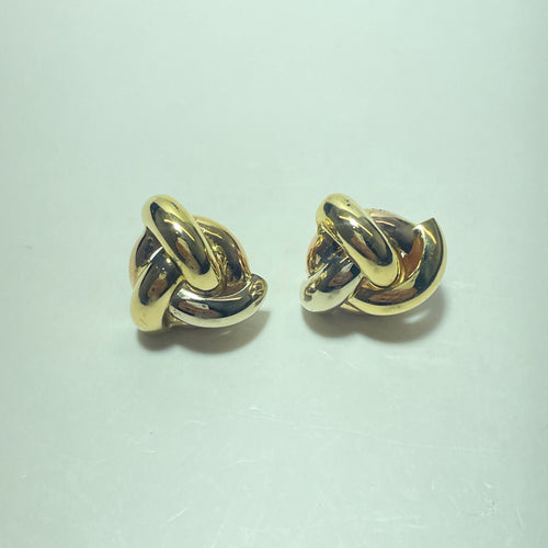 Boucles d'oreilles entrelacées en or jaune 18 carats 58 Facettes 260055