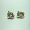Boucles d'oreilles entrelacées en or jaune 18 carats 58 Facettes 260055