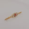 Broche Broche en or jaune, grenat et diamants 58 Facettes 3042187