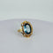 Bague 52 Bague vintage en or jaune 14 carats et topaze bleue 58 Facettes 2604029