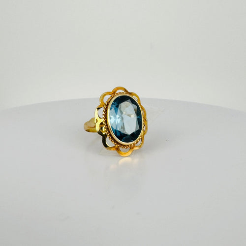 Bague 52 Bague vintage en or jaune 14 carats et topaze bleue 58 Facettes 2604029