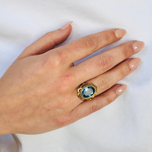Bague 52 Bague vintage en or jaune 14 carats et topaze bleue 58 Facettes 2604029