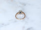 Bague 61 Bague marguerite ancienne en or rose, platine, saphir et diamants 58 Facettes