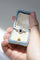 Bague 61 Bague marguerite ancienne en or rose, platine, saphir et diamants 58 Facettes