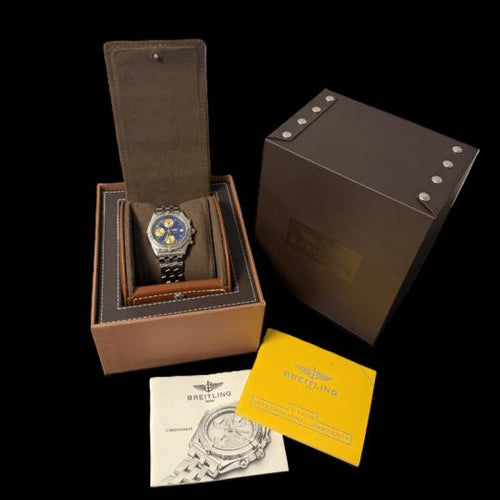 Montre Breitling Chronomat - Montre en acier et or 58 Facettes MT46203