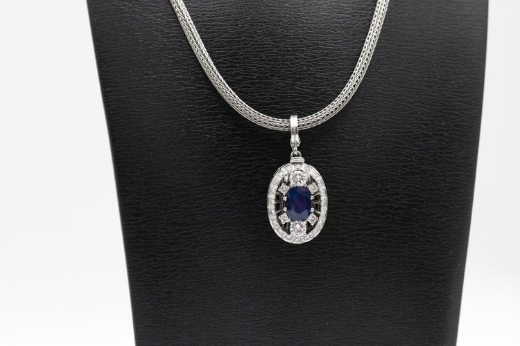 Collier Collier contemporain en platine, or blanc, saphir et diamants 58 Facettes 12159