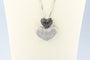 Collier Collier double cœur en or blanc 18K et diamants 58 Facettes CLDIAMBLACK-107
