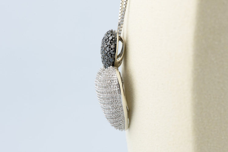 Collier Collier double cœur en or blanc 18K et diamants 58 Facettes CLDIAMBLACK-107