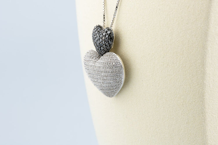 Collier Collier double cœur en or blanc 18K et diamants 58 Facettes CLDIAMBLACK-107