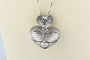 Collier Collier double cœur en or blanc 18K et diamants 58 Facettes CLDIAMBLACK-107