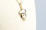 Collier Collier masque de Venise en or jaune, rubis, saphirs et émeraudes 58 Facettes PDVENICECC1422-107