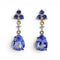 Boucles d'oreilles Boucles d'oreilles en or jaune 14 ct, tanzanites, saphirs et diamants 58 Facettes E012