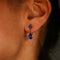 Boucles d'oreilles Boucles d'oreilles en or jaune 14 ct, tanzanites, saphirs et diamants 58 Facettes E012