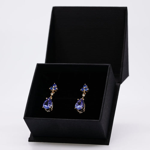 Boucles d'oreilles Boucles d'oreilles en or jaune 14 ct, tanzanites, saphirs et diamants 58 Facettes E012