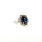 Bague 50 Bague marguerite vers 1960 en or blanc, saphir et diamants 58 Facettes