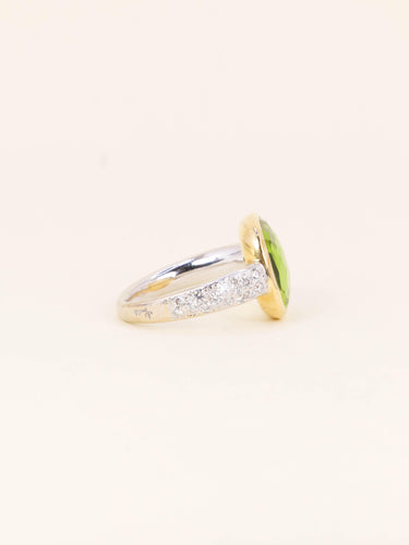Bague 54 Pomellato Shéhérazade - Bague en or jaune et blanc, péridot et diamants 58 Facettes 1274.3