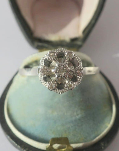 Bague 57 Bague marguerite en or blanc et diamants 58 Facettes Bague