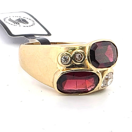 Bague en or jaune avec diamants et grenats 58 Facettes 364/26 C 175/26