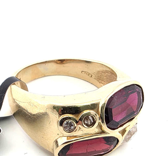 Bague en or jaune avec diamants et grenats 58 Facettes 364/26 C 175/26