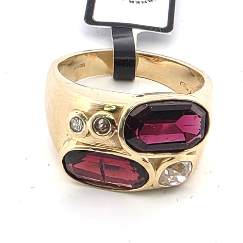 Bague en or jaune avec diamants et grenats 58 Facettes 364/26 C 175/26