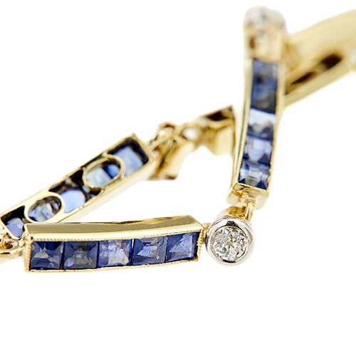 Bracelet Art déco - Bracelet en or jaune et blanc, saphirs et diamants 58 Facettes 39520