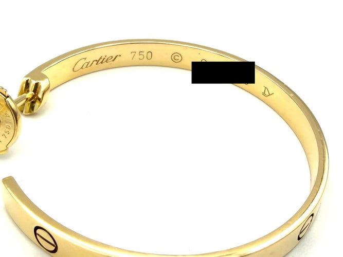 Boucles d'oreilles Cartier Love - Créoles grand modèle en or jaune 18K 58 Facettes CARTIER BO