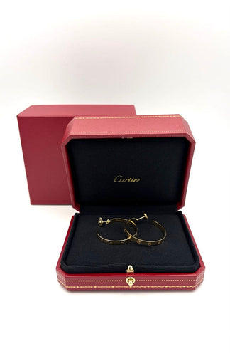 Boucles d'oreilles Cartier Love - Créoles grand modèle en or jaune 18K 58 Facettes CARTIER BO