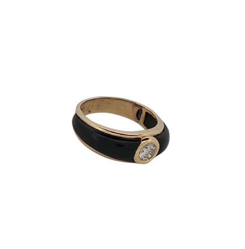 Bague en or jaune, résine noire et diamant